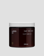 Cukrový telový peeling s makadamiovým olejom, bambuckým maslom a avokádovým olejom Uddo