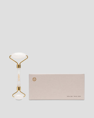 Masážny valček na tvár Uddo s bielym jadeitom, ktorý redukuje očné tiene a opuchy